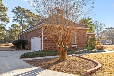 This all-brick ranch, 3-bedroom, 2-bathroom home has been on North Shore Country Club in North Carolina - for sale on GolfHomes.com, golf home, golf lot