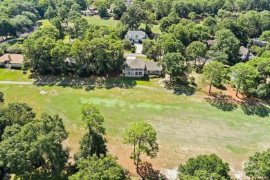 Check out this amazing, modern home nestled in this quiet cul de on Lake Forest Yacht and Country Club in Alabama - for sale on GolfHomes.com, golf home, golf lot