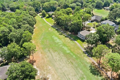 Check out this amazing, modern home nestled in this quiet cul de on Lake Forest Yacht and Country Club in Alabama - for sale on GolfHomes.com, golf home, golf lot