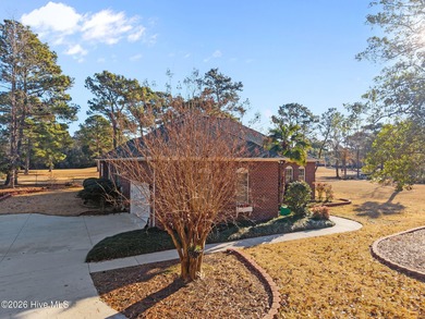 This all-brick ranch, 3-bedroom, 2-bathroom home has been on North Shore Country Club in North Carolina - for sale on GolfHomes.com, golf home, golf lot
