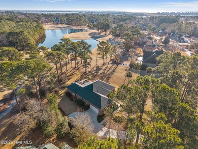 This all-brick ranch, 3-bedroom, 2-bathroom home has been on North Shore Country Club in North Carolina - for sale on GolfHomes.com, golf home, golf lot