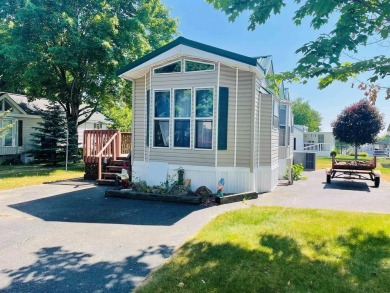 Look no further! This cute manufactured home in Christmas on Christmas Mountain Village Golf Course in Wisconsin - for sale on GolfHomes.com, golf home, golf lot