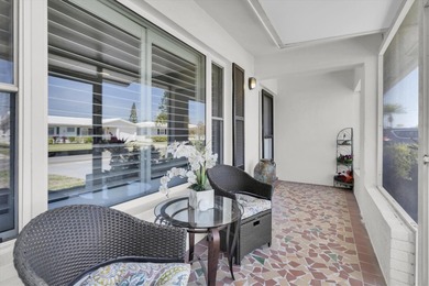 This stunning 2 bedroom, 2 bath, 1 car garage, 1649 sq. ft. home on Mainlands Golf Club in Florida - for sale on GolfHomes.com, golf home, golf lot