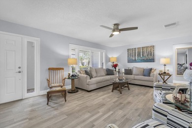 This stunning 2 bedroom, 2 bath, 1 car garage, 1649 sq. ft. home on Mainlands Golf Club in Florida - for sale on GolfHomes.com, golf home, golf lot