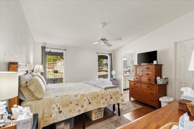 This charming and exceptionally well-maintained modular home is on Quail Wood Greens Golf Course in Arizona - for sale on GolfHomes.com, golf home, golf lot