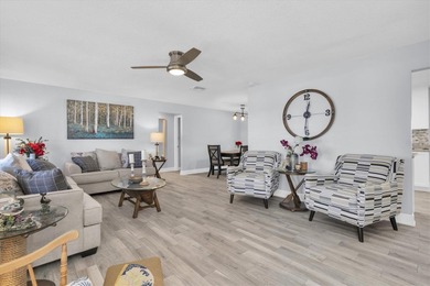 This stunning 2 bedroom, 2 bath, 1 car garage, 1649 sq. ft. home on Mainlands Golf Club in Florida - for sale on GolfHomes.com, golf home, golf lot