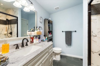 This charming and exceptionally well-maintained modular home is on Quail Wood Greens Golf Course in Arizona - for sale on GolfHomes.com, golf home, golf lot