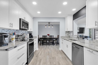 This stunning 2 bedroom, 2 bath, 1 car garage, 1649 sq. ft. home on Mainlands Golf Club in Florida - for sale on GolfHomes.com, golf home, golf lot