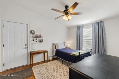 This charming and exceptionally well-maintained modular home is on Quail Wood Greens Golf Course in Arizona - for sale on GolfHomes.com, golf home, golf lot
