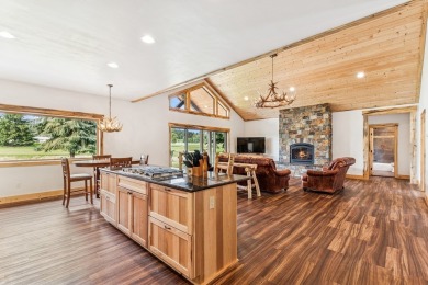 This superb single-level home overlooks the pond on the 14th on Eagle Bend Golf Course in Montana - for sale on GolfHomes.com, golf home, golf lot