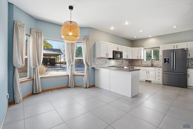 Listed by Lori Barnett, Engel & Volkers Black Hills, .   Nestled on Golf Club At Red Rock in South Dakota - for sale on GolfHomes.com, golf home, golf lot