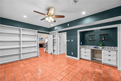 Experience elegant living in this spacious 4-bedroom, 4-bath on Corpus Christi Country Club Golf Course in Texas - for sale on GolfHomes.com, golf home, golf lot