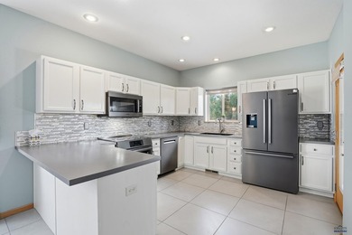 Listed by Lori Barnett, Engel & Volkers Black Hills, .   Nestled on Golf Club At Red Rock in South Dakota - for sale on GolfHomes.com, golf home, golf lot