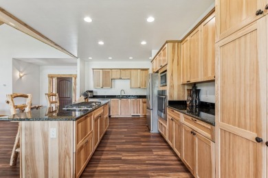This superb single-level home overlooks the pond on the 14th on Eagle Bend Golf Course in Montana - for sale on GolfHomes.com, golf home, golf lot