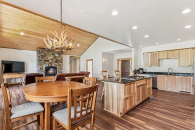 This superb single-level home overlooks the pond on the 14th on Eagle Bend Golf Course in Montana - for sale on GolfHomes.com, golf home, golf lot