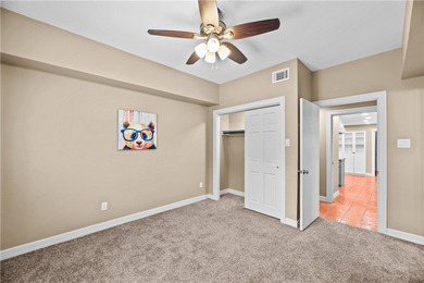 Experience elegant living in this spacious 4-bedroom, 4-bath on Corpus Christi Country Club Golf Course in Texas - for sale on GolfHomes.com, golf home, golf lot