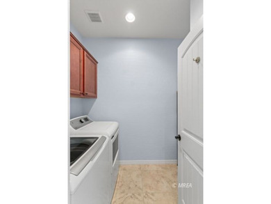 This gorgeous, move-in ready home is situated on an elevated on Conestoga Golf Club in Nevada - for sale on GolfHomes.com, golf home, golf lot