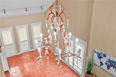 Experience elegant living in this spacious 4-bedroom, 4-bath on Corpus Christi Country Club Golf Course in Texas - for sale on GolfHomes.com, golf home, golf lot