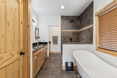 This superb single-level home overlooks the pond on the 14th on Eagle Bend Golf Course in Montana - for sale on GolfHomes.com, golf home, golf lot