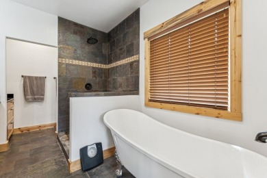 This superb single-level home overlooks the pond on the 14th on Eagle Bend Golf Course in Montana - for sale on GolfHomes.com, golf home, golf lot