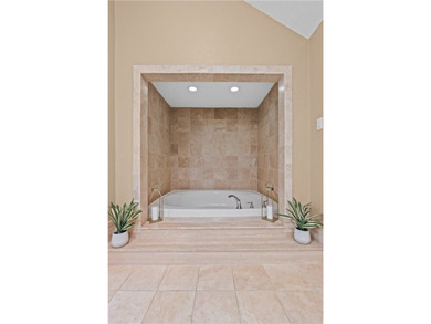 Experience elegant living in this spacious 4-bedroom, 4-bath on Corpus Christi Country Club Golf Course in Texas - for sale on GolfHomes.com, golf home, golf lot