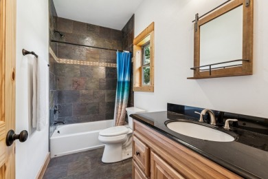 This superb single-level home overlooks the pond on the 14th on Eagle Bend Golf Course in Montana - for sale on GolfHomes.com, golf home, golf lot