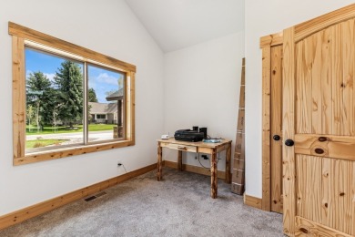 This superb single-level home overlooks the pond on the 14th on Eagle Bend Golf Course in Montana - for sale on GolfHomes.com, golf home, golf lot