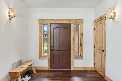 This superb single-level home overlooks the pond on the 14th on Eagle Bend Golf Course in Montana - for sale on GolfHomes.com, golf home, golf lot