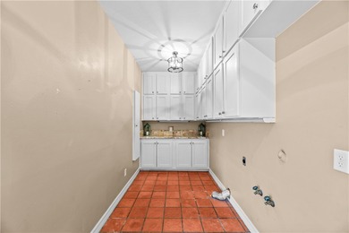 Experience elegant living in this spacious 4-bedroom, 4-bath on Corpus Christi Country Club Golf Course in Texas - for sale on GolfHomes.com, golf home, golf lot