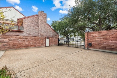 Experience elegant living in this spacious 4-bedroom, 4-bath on Corpus Christi Country Club Golf Course in Texas - for sale on GolfHomes.com, golf home, golf lot