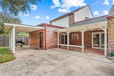 Experience elegant living in this spacious 4-bedroom, 4-bath on Corpus Christi Country Club Golf Course in Texas - for sale on GolfHomes.com, golf home, golf lot