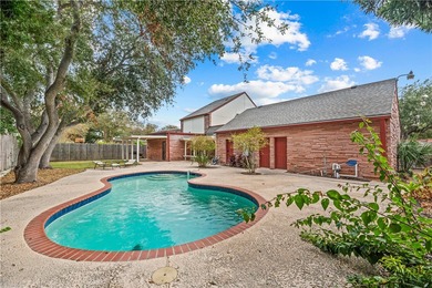 Experience elegant living in this spacious 4-bedroom, 4-bath on Corpus Christi Country Club Golf Course in Texas - for sale on GolfHomes.com, golf home, golf lot