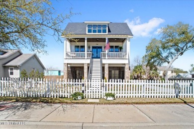 This raised house, perched gracefully on a 1-acre lot, offers an on Pass Christian Isles Golf Club in Mississippi - for sale on GolfHomes.com, golf home, golf lot