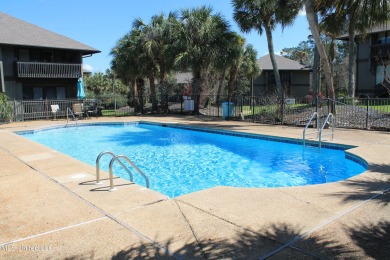 Don't miss out on this inviting ground-level condo offering on Diamondhead Country Club in Mississippi - for sale on GolfHomes.com, golf home, golf lot