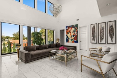 Experience modern coastal elegance in this architecturally on Tiger Point Golf and Country Club in Florida - for sale on GolfHomes.com, golf home, golf lot