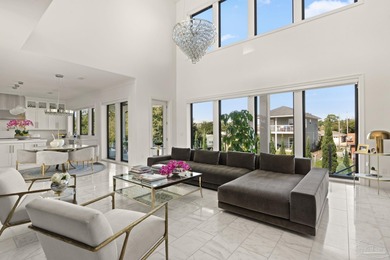 Experience modern coastal elegance in this architecturally on Tiger Point Golf and Country Club in Florida - for sale on GolfHomes.com, golf home, golf lot