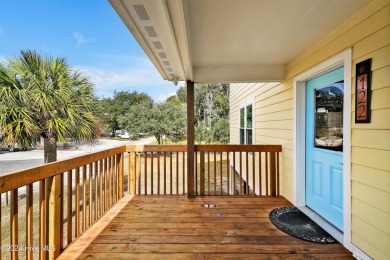 Welcome to waterfront living on Big Davis Canal! Looking out on Founders Club At St. James Plantation in North Carolina - for sale on GolfHomes.com, golf home, golf lot