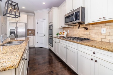 Welcome Home! Nestled in the heart of the highly sought-after on Bartram Trail Golf Club in Georgia - for sale on GolfHomes.com, golf home, golf lot