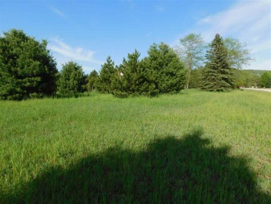 Beautiful level building site on .81 acres with views of Nubs on Boyne Highlands Golf Courses in Michigan - for sale on GolfHomes.com, golf home, golf lot