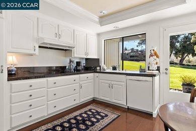 Located in desirable lagoon entry E1 this lower level Sierra on Rossmoor Golf Course in California - for sale on GolfHomes.com, golf home, golf lot