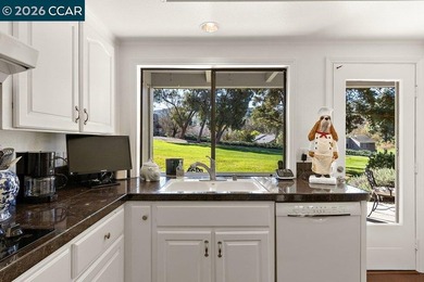 Located in desirable lagoon entry E1 this lower level Sierra on Rossmoor Golf Course in California - for sale on GolfHomes.com, golf home, golf lot