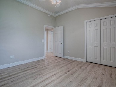 BOND PAID! ROOF 2025!  HVAC 2023!  HWH 2021.  Very Popular on Redfish Run Executive Golf Course in Florida - for sale on GolfHomes.com, golf home, golf lot