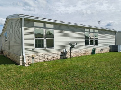 I dare you to take a look at this Palm Harbor 1,512' sq ft, 2 on Southport Springs Golf Club in Florida - for sale on GolfHomes.com, golf home, golf lot