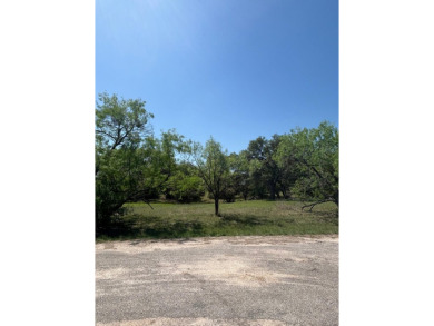 Large level lot in Horseshoe Bay West with great trees and on Ram Rock Golf Course in Texas - for sale on GolfHomes.com, golf home, golf lot