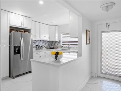 Luxury condo with 2 bedrooms, 2 bathrooms completely remodeled on Sunrise Lakes Phase IV Golf Course in Florida - for sale on GolfHomes.com, golf home, golf lot