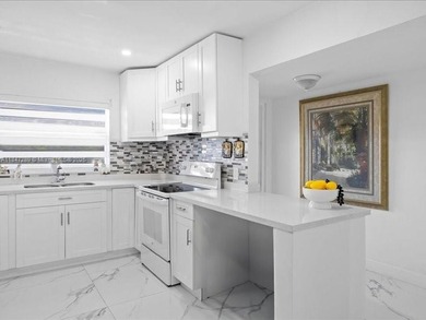 Luxury condo with 2 bedrooms, 2 bathrooms completely remodeled on Sunrise Lakes Phase IV Golf Course in Florida - for sale on GolfHomes.com, golf home, golf lot