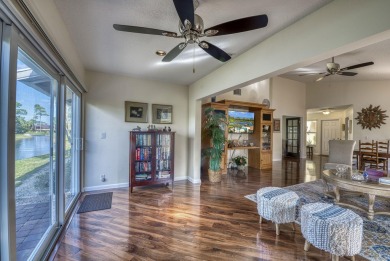 The moment you walk into this home you will feel at home as you on Old Marsh Golf Club in Florida - for sale on GolfHomes.com, golf home, golf lot