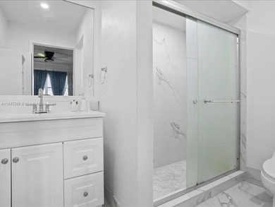 Luxury condo with 2 bedrooms, 2 bathrooms completely remodeled on Sunrise Lakes Phase IV Golf Course in Florida - for sale on GolfHomes.com, golf home, golf lot