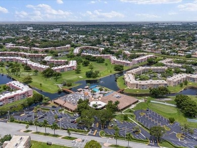 Luxury condo with 2 bedrooms, 2 bathrooms completely remodeled on Sunrise Lakes Phase IV Golf Course in Florida - for sale on GolfHomes.com, golf home, golf lot