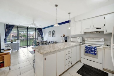 Enjoy resort style living in this charming 1 BR condo on Ocean Village Golf Course in Florida - for sale on GolfHomes.com, golf home, golf lot